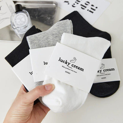 Wholesale women's/men's spring cotton sweat-absorbent sports socks mid-calf socks