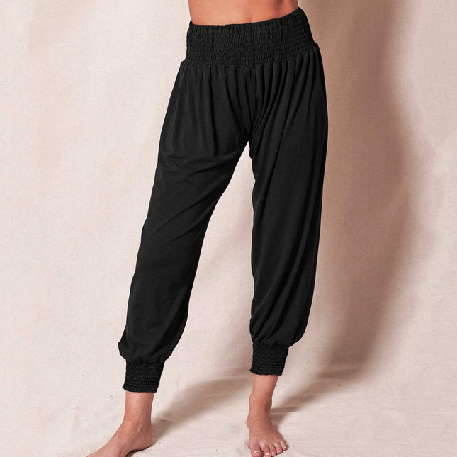 Venta al por mayor de mujeres en casa ocio pantalones sueltos pantalones de yoga de deportes de color sólido