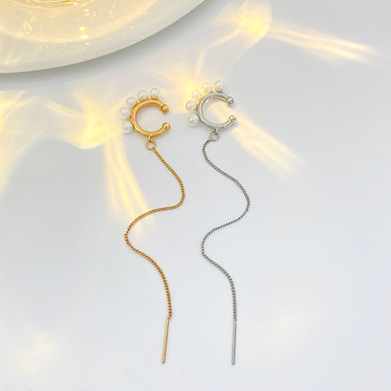 Pendiente único de alambre de oreja de borla larga con clip de hueso del oído de perla