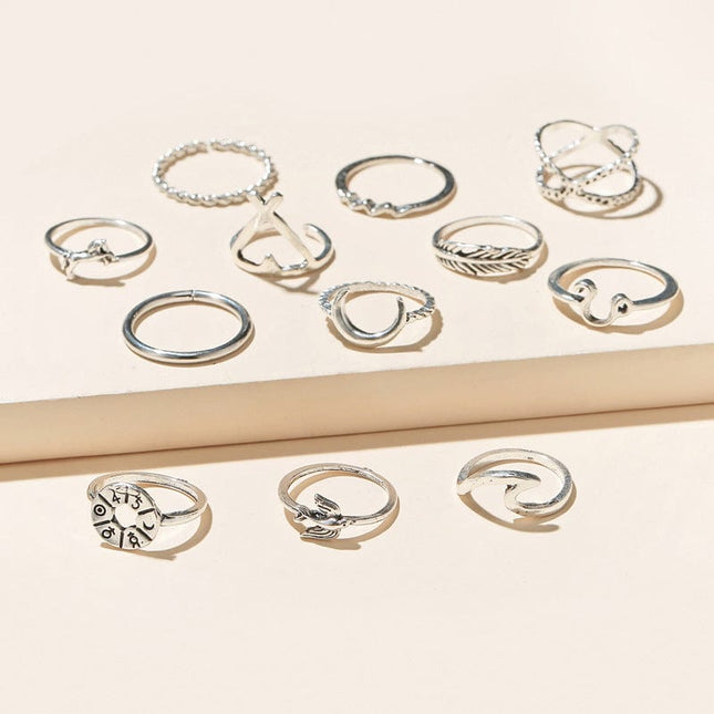 Juego de anillos irregulares geométricos de plumas de luna vintage de doce piezas