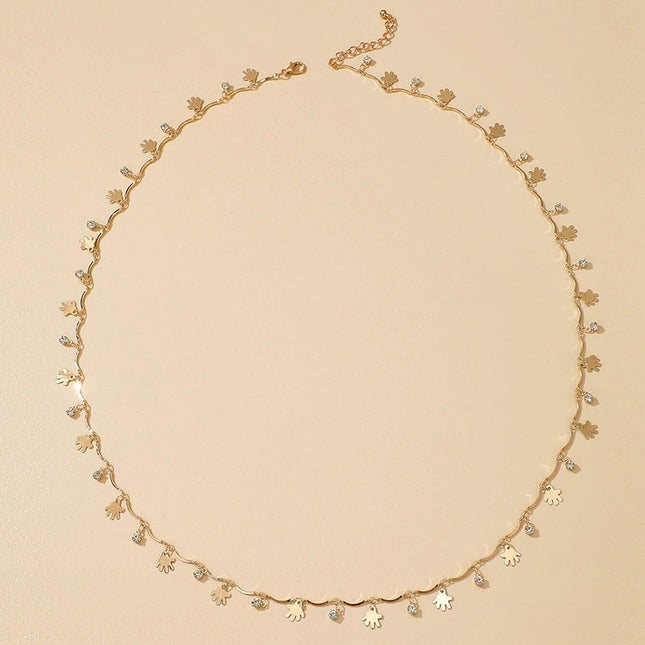 Cadena de cintura de una sola capa con borla de disco geométrico de diamantes de imitación de palma