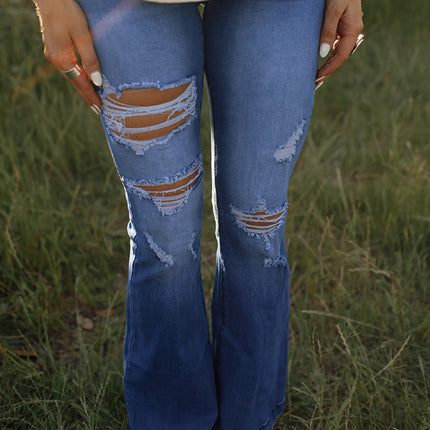 Jeans acampanados rasgados de mezclilla suelta de cintura alta para mujer