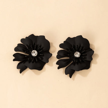 Venta al por mayor Pendientes de diamantes de imitación de flor negra para damas de aleación