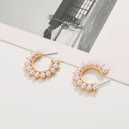 Venta al por mayor Pendientes de perlas de sol de moda Pendientes de aro de moda