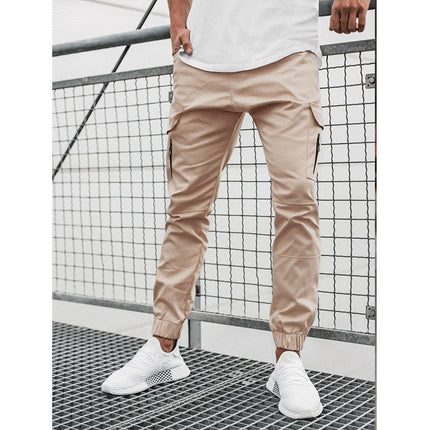 Pantalones casuales de color sólido con ribete de bolsillo con cremallera lateral para hombre