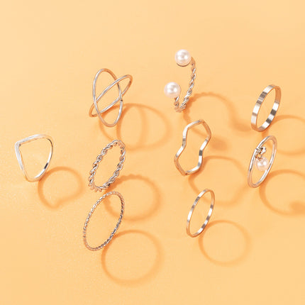 Neunteiliges Ringset mit gekreuzten Twist-Perlen