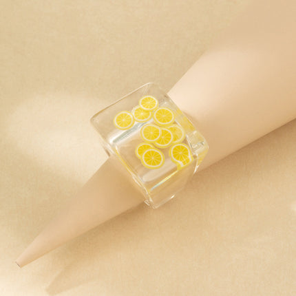 Harzring mit eingelegten Reisperlen Zitronenfarbener Ring