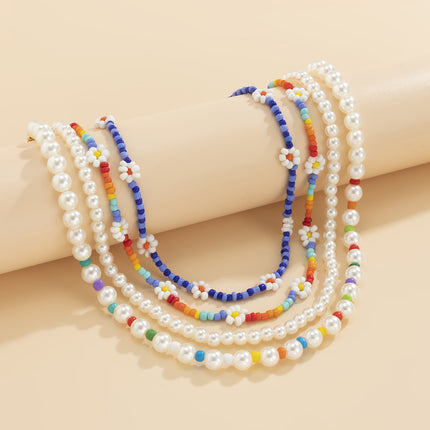 Collar de perlas de perlas de arroz con flores de margaritas coloridas al por mayor