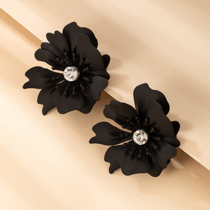 Venta al por mayor Pendientes de diamantes de imitación de flor negra para damas de aleación