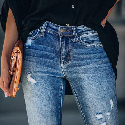 Jeans pitillo de mujer con botones desgastados lavados