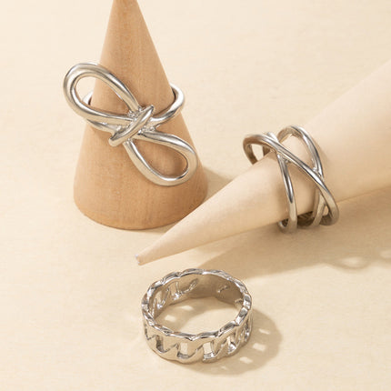 Conjunto de tres piezas de anillo cruzado con nudo de lazo de figura torcida geométrica 8