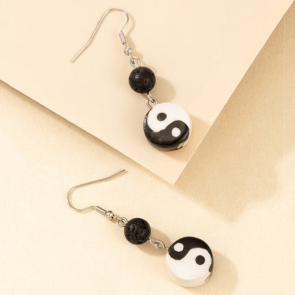 Pendientes de aleación de chismes de Tai Chi en blanco y negro de color de contraste de bola negra simple de aceite de goteo